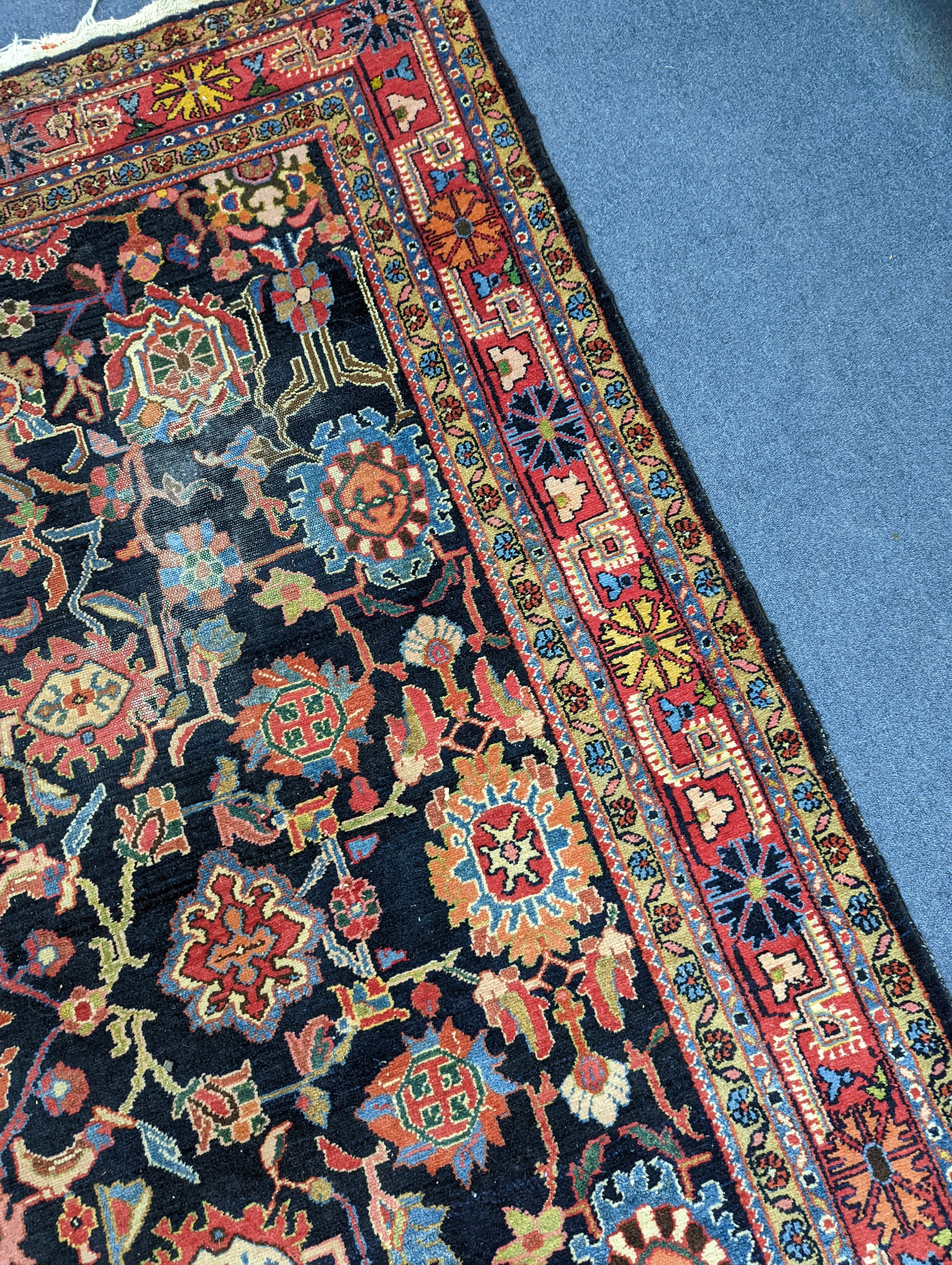 A Heriz / Moghal blue ground carpet, 340 x 206cm